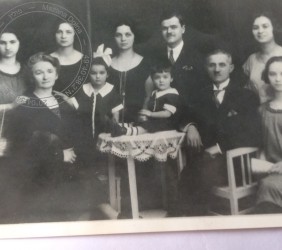 3.	Jochwed’s silver wedding anniversary in 1924. In the first row, from left to right: Jochwed Schwitzer and her grandduaghter Edith Königsberg, Helen’s mother. Edith’s sister Alicja, Jochwed’s husband Wolf Trompeter, and one more of their daughters. In the second row: two more daughters and Jochwed’s another daughter, Rosa (Rachel), Helen’s grandmother. Jochwed’s son-in-law Maks Königsberg and Jochwed’s fifth daughter. Source: Helen Krag’s family collection.